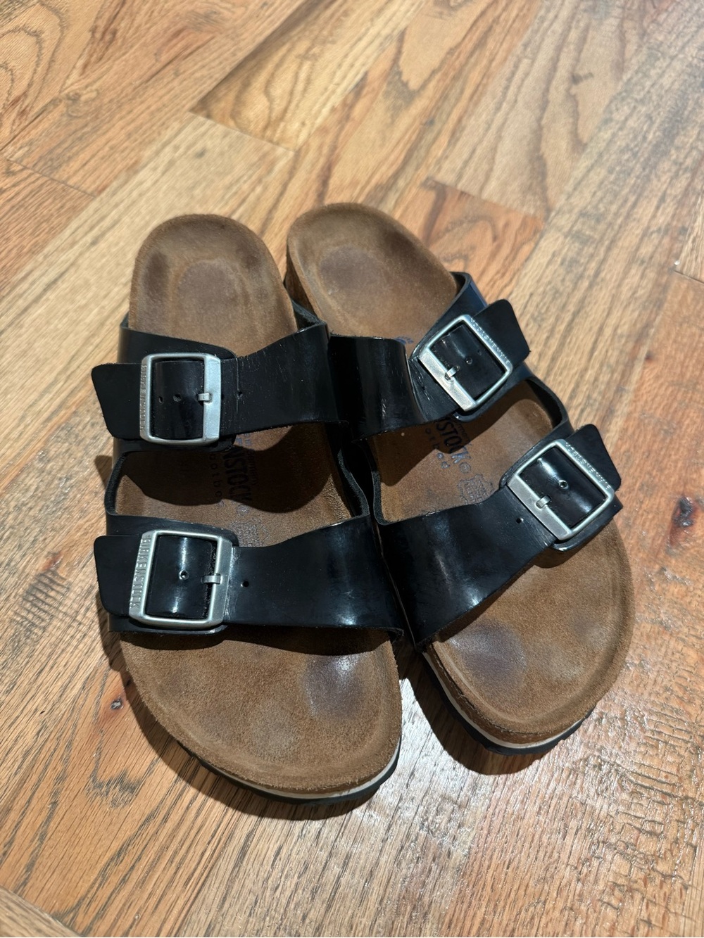 Woman’s patent leather black Birkenstock sandals size 42